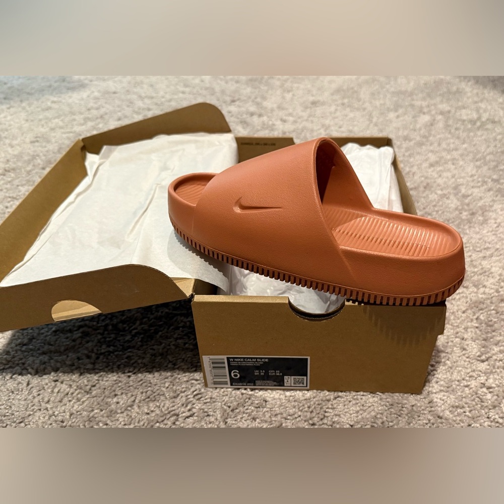 New Nike slides. Lovely terra cotta color to match anything in your closet.